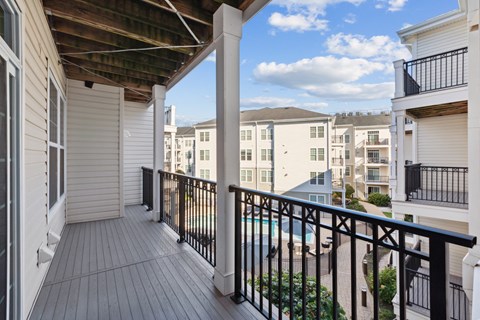 Balcony with view of the swimming pool at West 130, West Hempstead, New York 