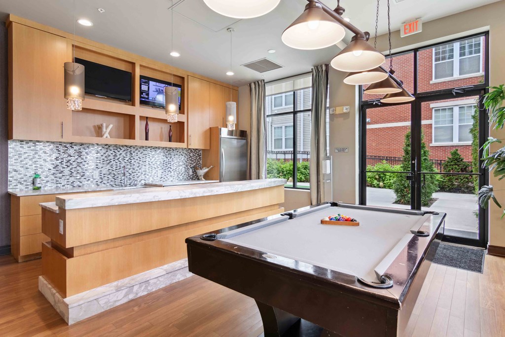 pool table at the district flats apartments in lenexa, ks at West 130, West Hempstead