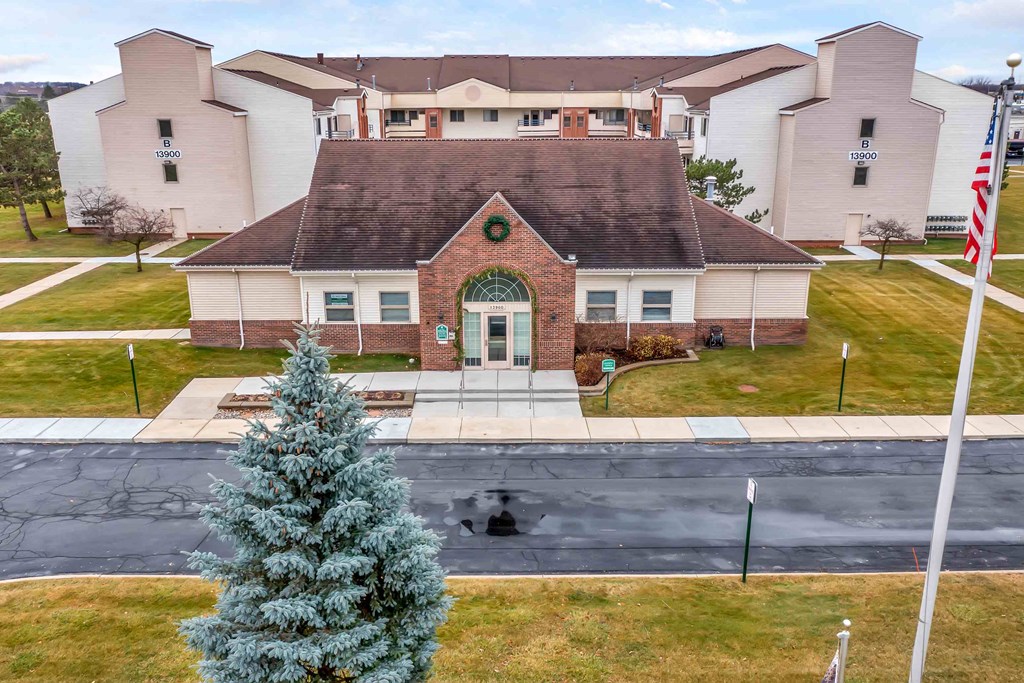 a house with a christmas tree in front of it