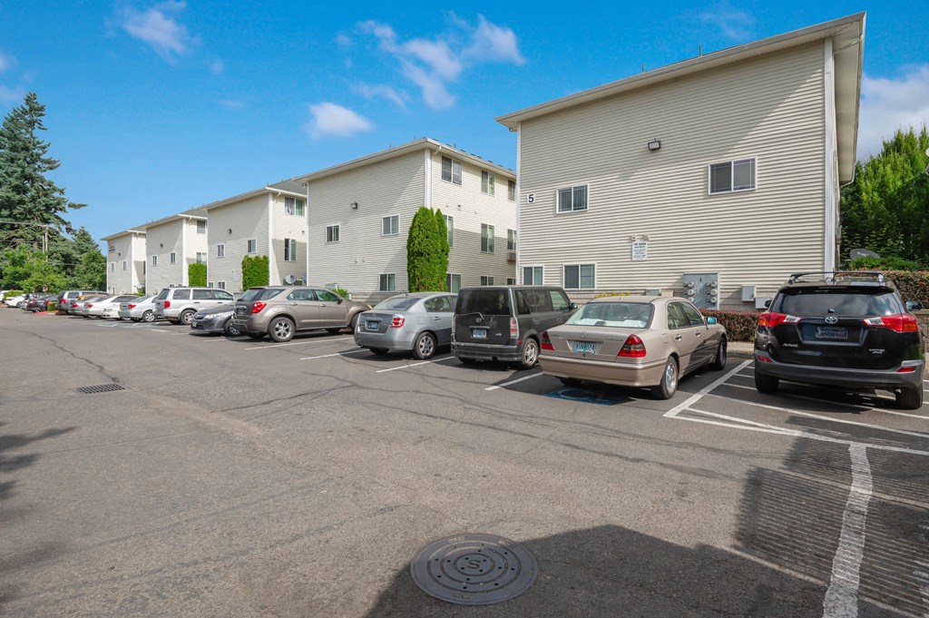 a large parking lot in front of a building