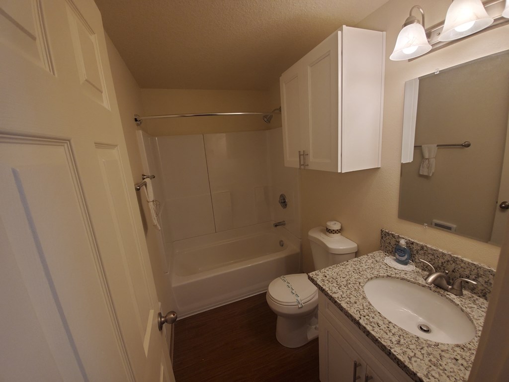 this is a photo of the bathroom of a 1 bedroom apartment at deer hill apartments in c