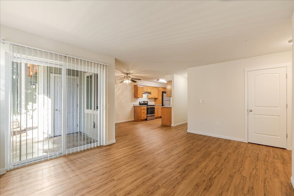 Cascade Woods living area with sliding glass door
