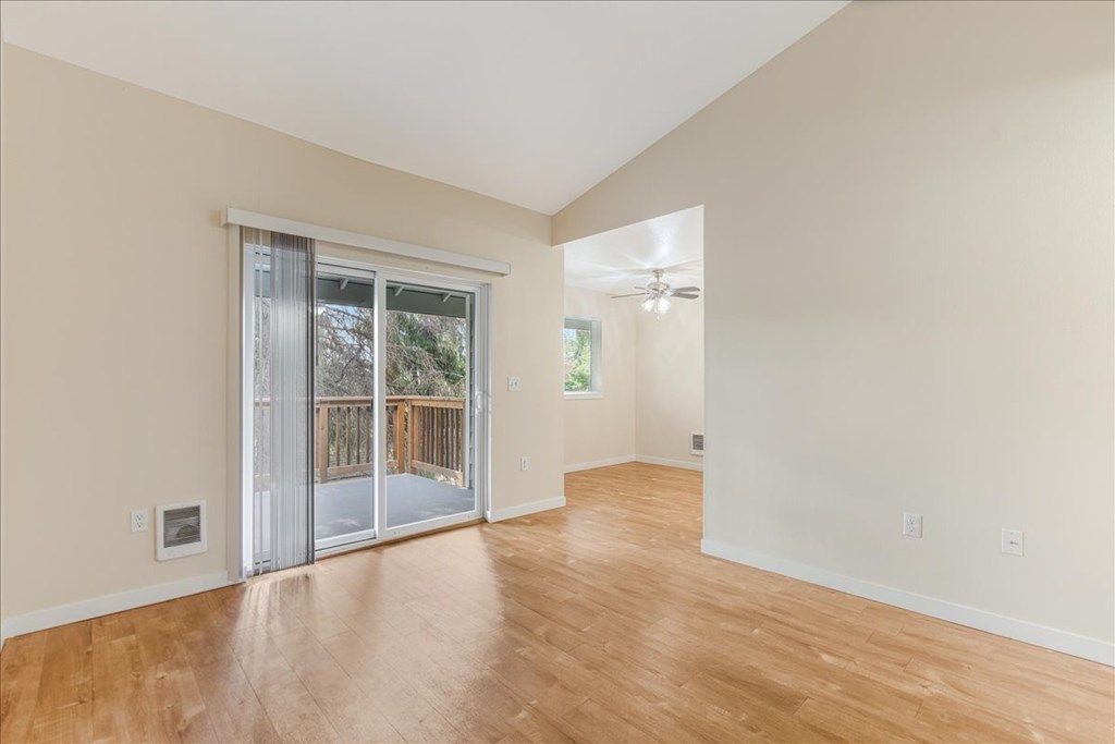 Cascade Woods living area with sliding glass door