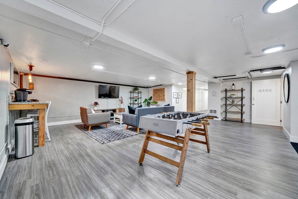 our apartments offer a living room with a fireplace and a flat screen tv Sunset Station Apartments Portland Oregon 