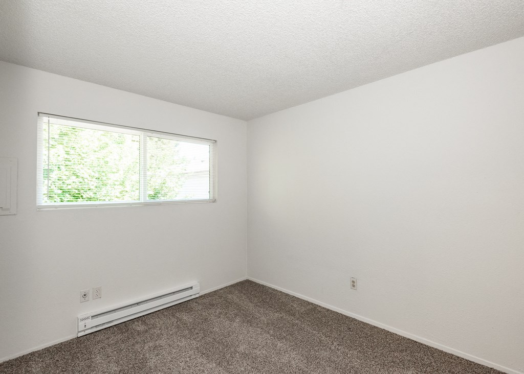 a bedroom with a Clark Apartments Vancouver, WA Bedroom