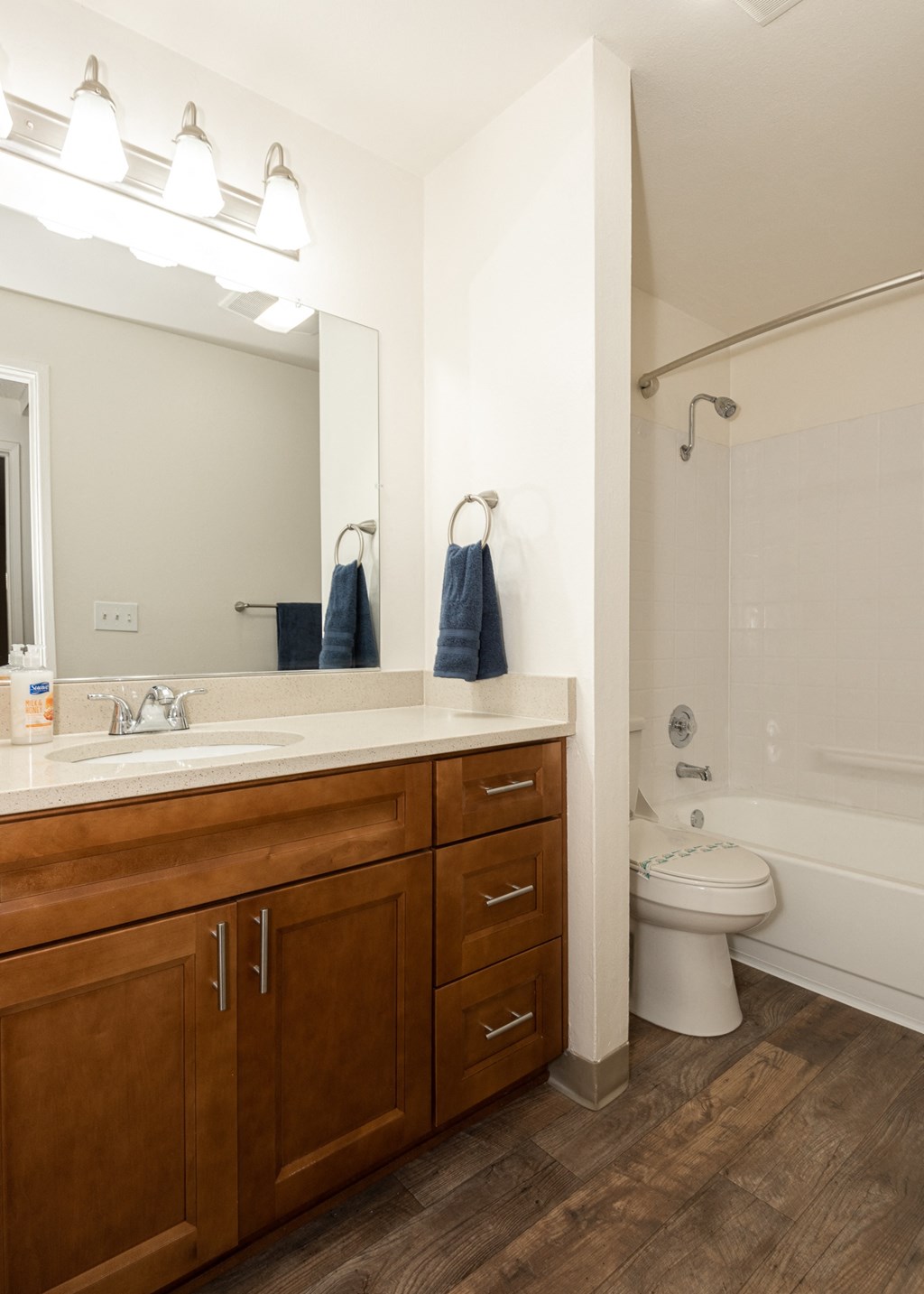 a bathroom with a toilet sink and bathtub