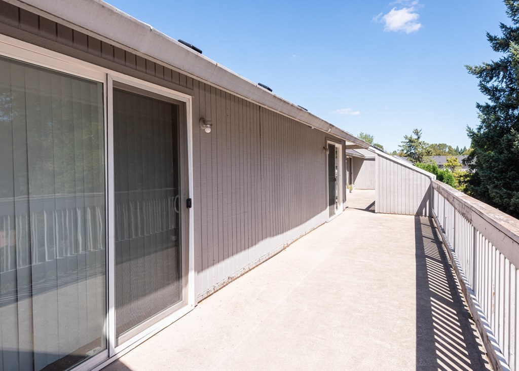 one of two balconies at the whispering winds apartments in pearland, tx