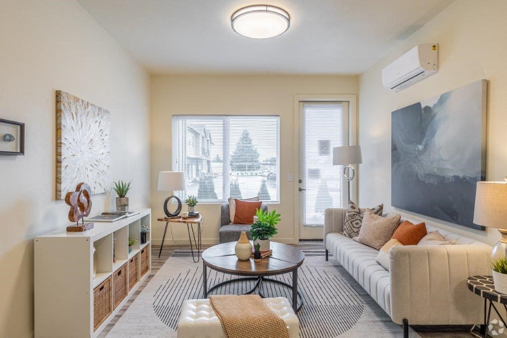 a living room with a couch and a table