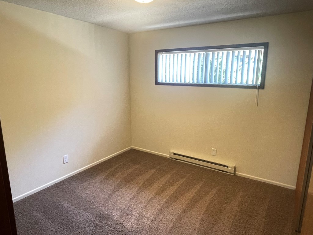 Metro Park Terrace  bedroom with a window