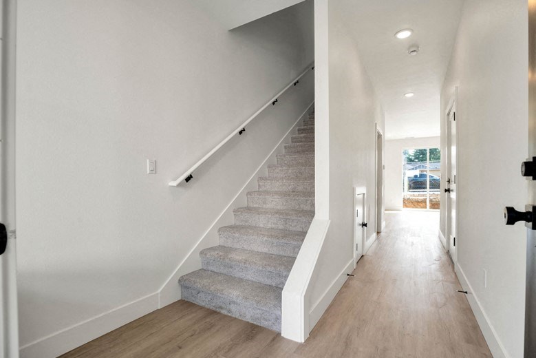 the stairway up to the second floor of a house