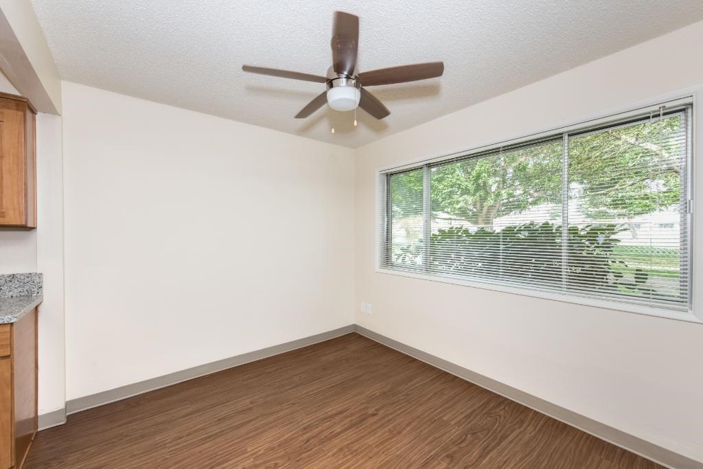 Royal Greens Dining Room with Hardwood Floors