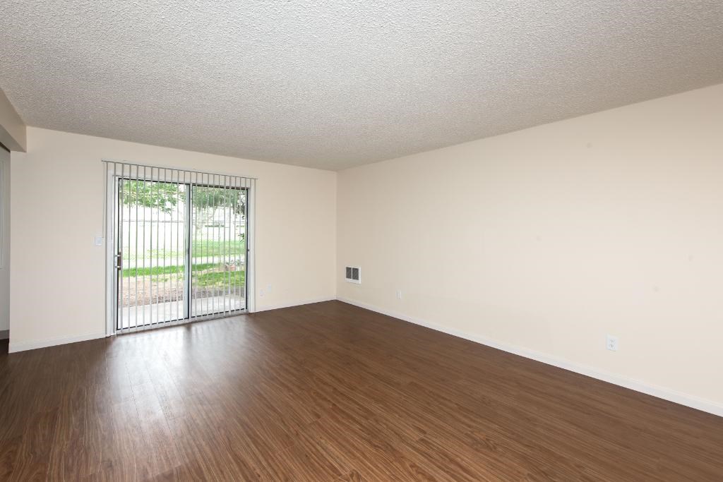 Royal Greens Living Room with Patio View