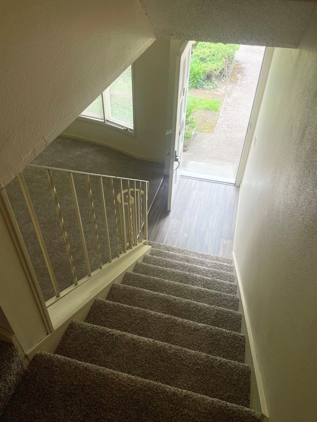 a view from the top of the stairs looking down