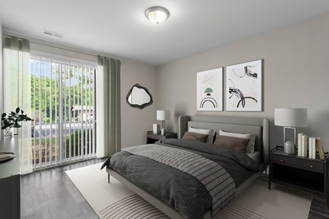 A bedroom with a large bed and a lamp on the side table.