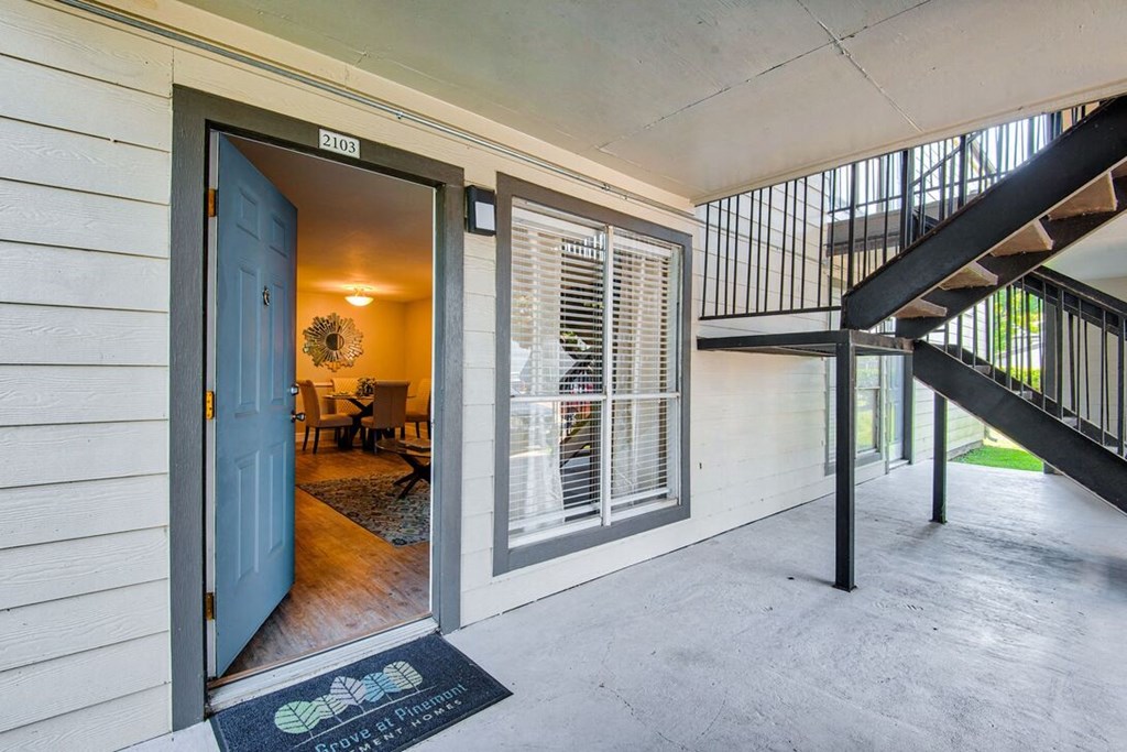 A house number 2103 is visible on the door.