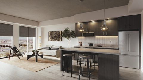 A modern kitchen with a bar area and a view of the city.