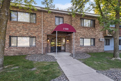 The entrance to a building with the number 1500 on it.