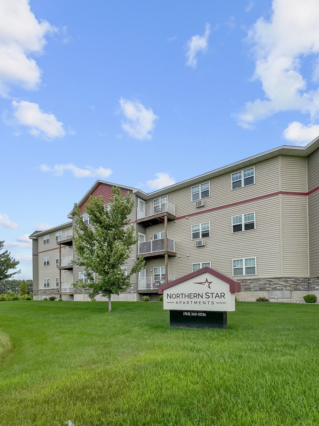 A building with a sign that says "Northern Star Apartments".