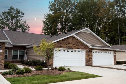 Noblesville IN Apartment Rentals Redwood Noblesville Harewood Drive Main Exterior at Dusk