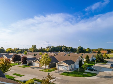 A residential neighborhood with houses and trees.