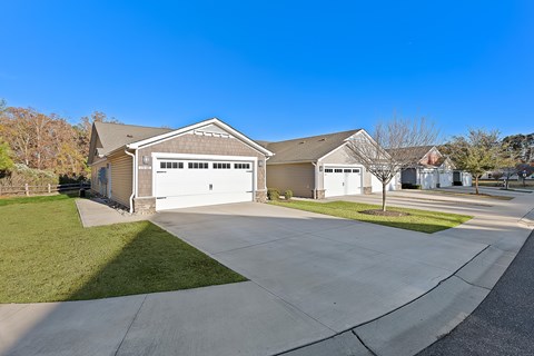 A two-car garage is attached to a house.