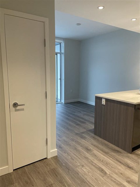 an empty room with a mirror