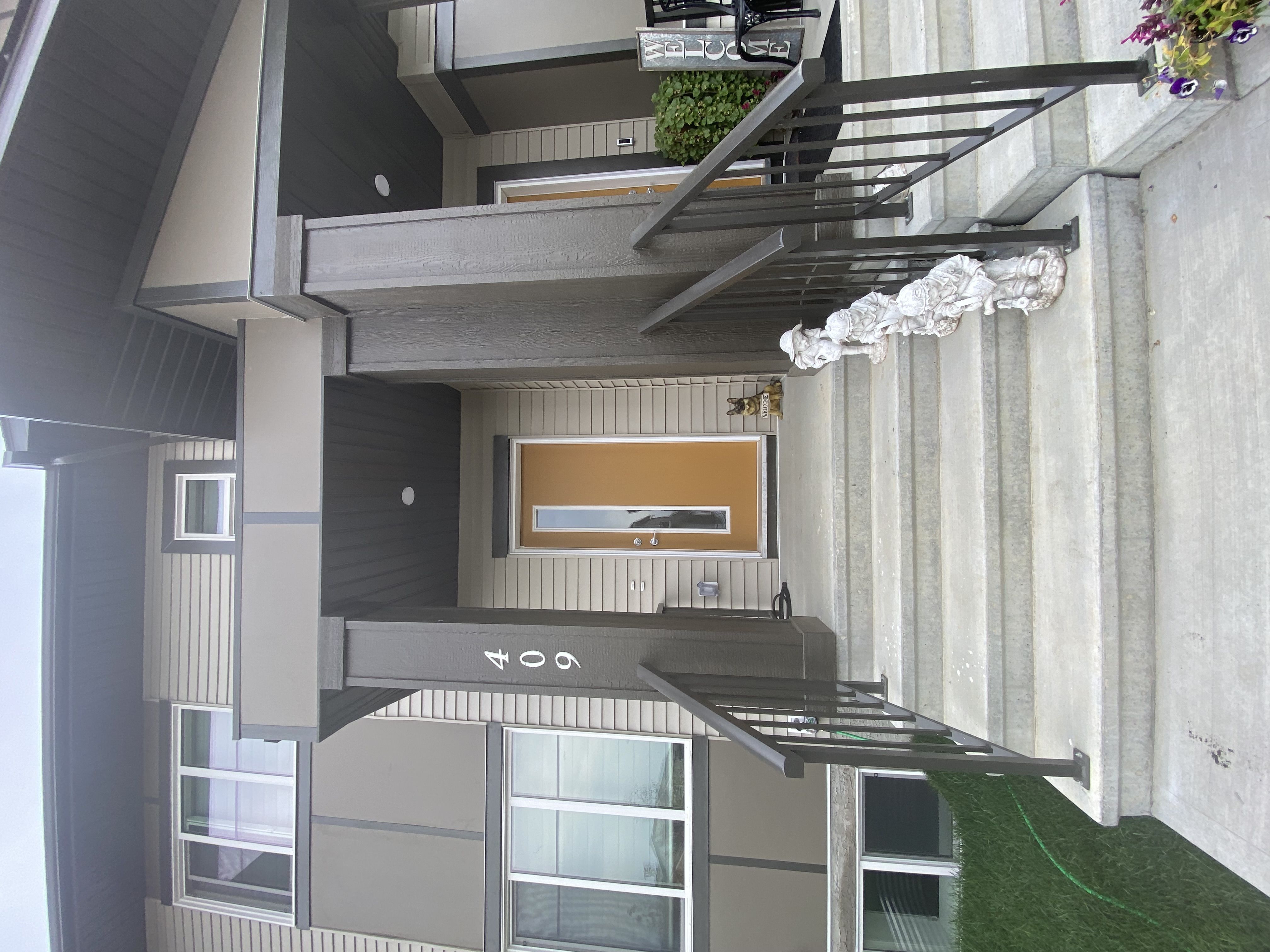 A modern building with a balcony and a window.
