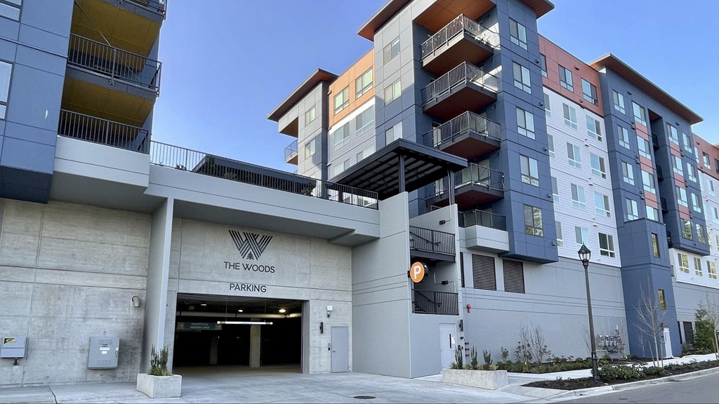 a view of the wyndham pacifica apartments from the street