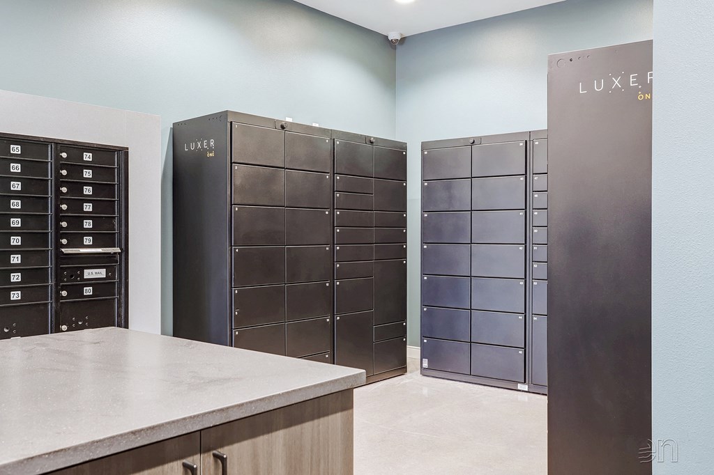 a room with lockers and a counter with a counter top