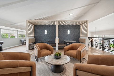 a living room with couches and a table