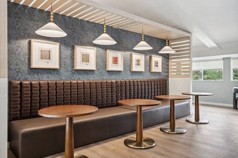 a rendering of a booth and tables in a restaurant