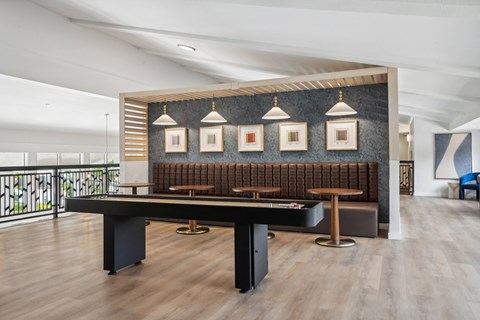 a billiards table in the lobby of a building