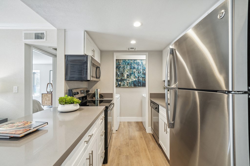 Sofi at Wood Ranch Apartments Kitchen and washer and dryer