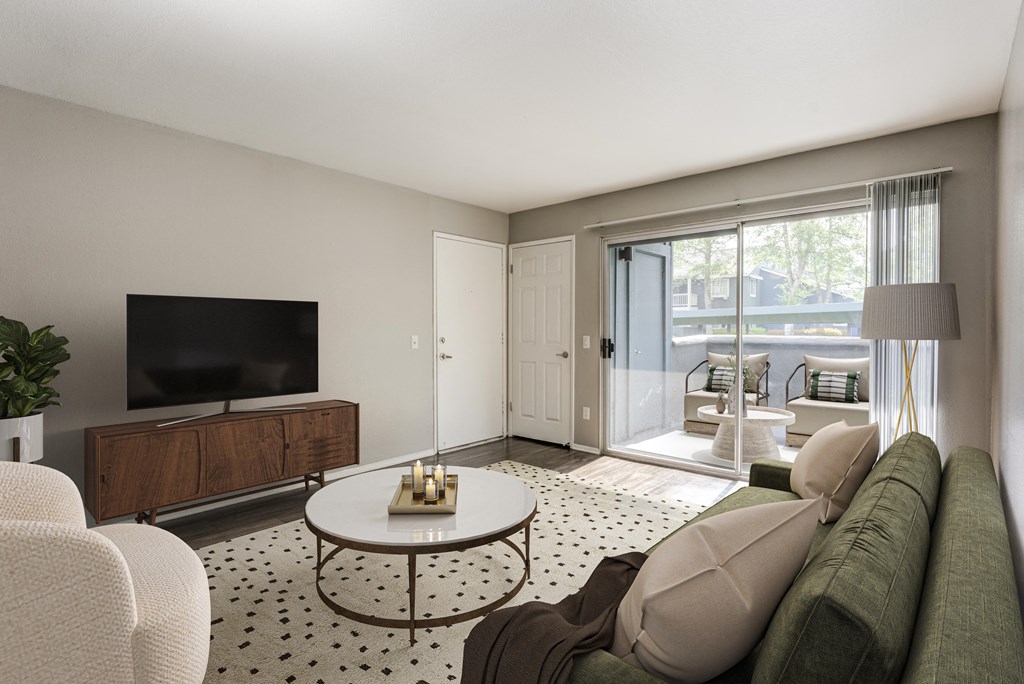 a living room with a couch and a tv