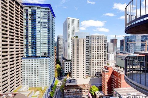 a view of the city from a high rise building
