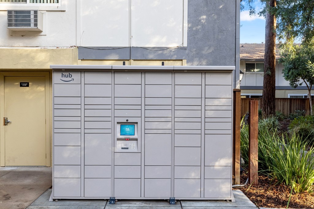 a garage door with a white gate with a blue screen on it