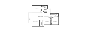 A floor plan of a house with a living room, dining room, kitchen, and four bedrooms.