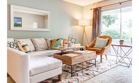 a living room with a couch and a coffee table