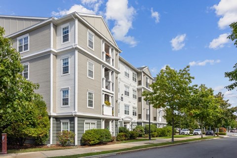 A large apartment building with multiple windows and balconies.