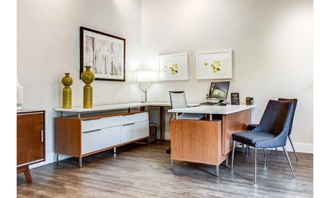a home office with a desk and a computer