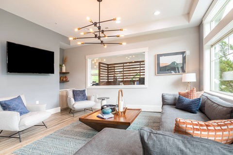 a living room with couches and a coffee table