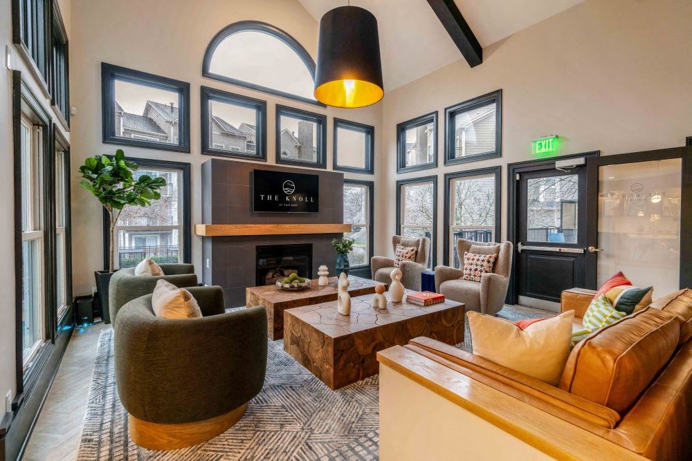 A living room with a fireplace and a couch.