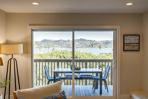 Harbor Point living room with deck view