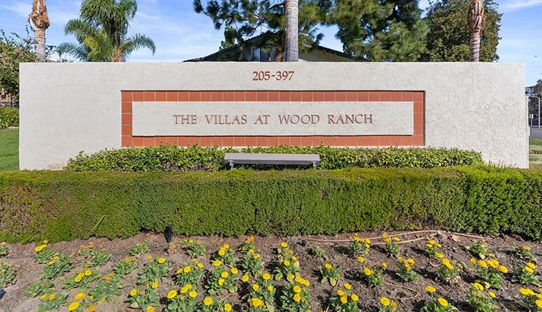 a sign for the villas at wood ranch