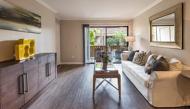 a living room with a couch and a table