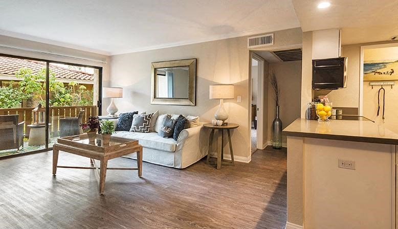 a living room with a couch and a table