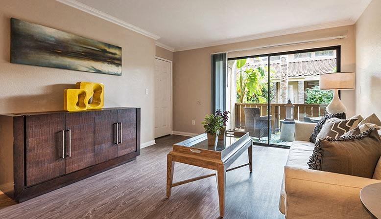 a living room with a couch and a table