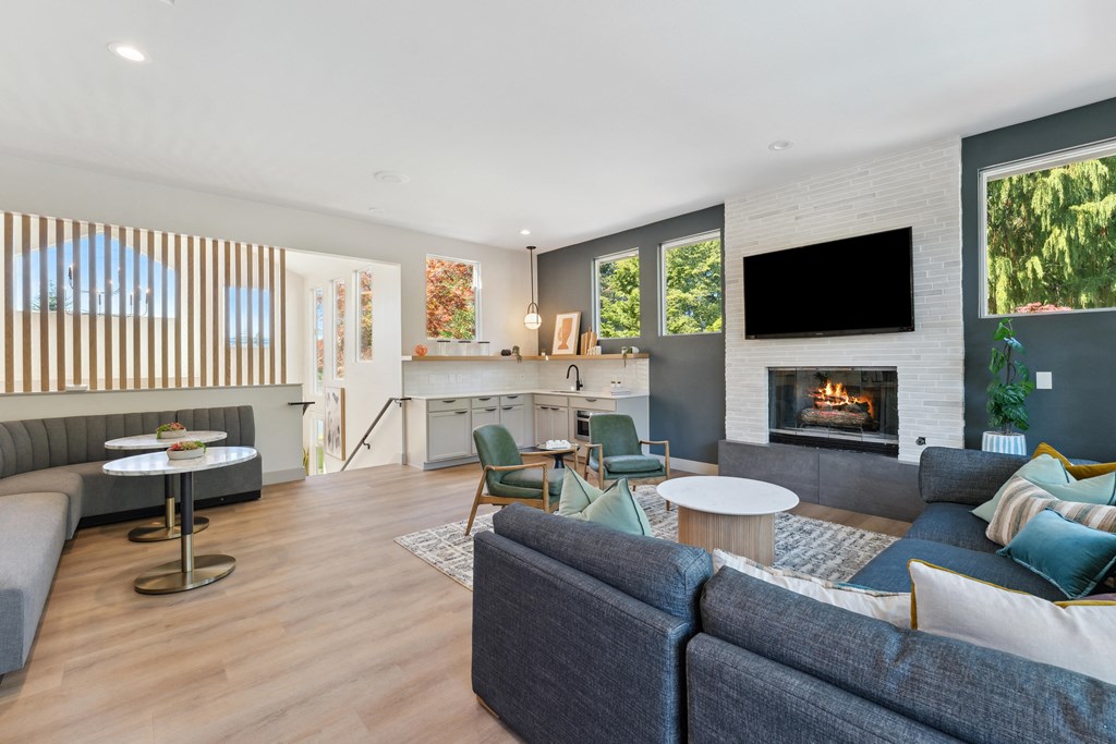 a living room with a fireplace and a couch