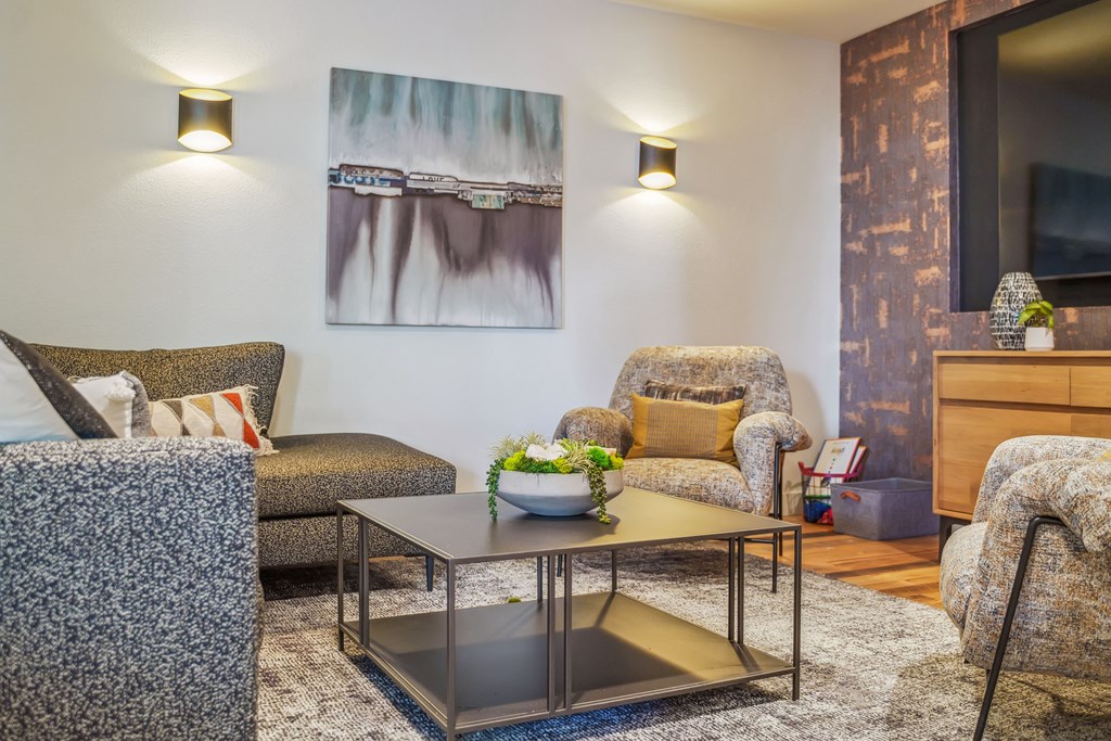 a living room with couches and a coffee table