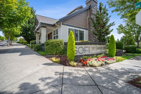 A building with the sign "SOF" in front of it.